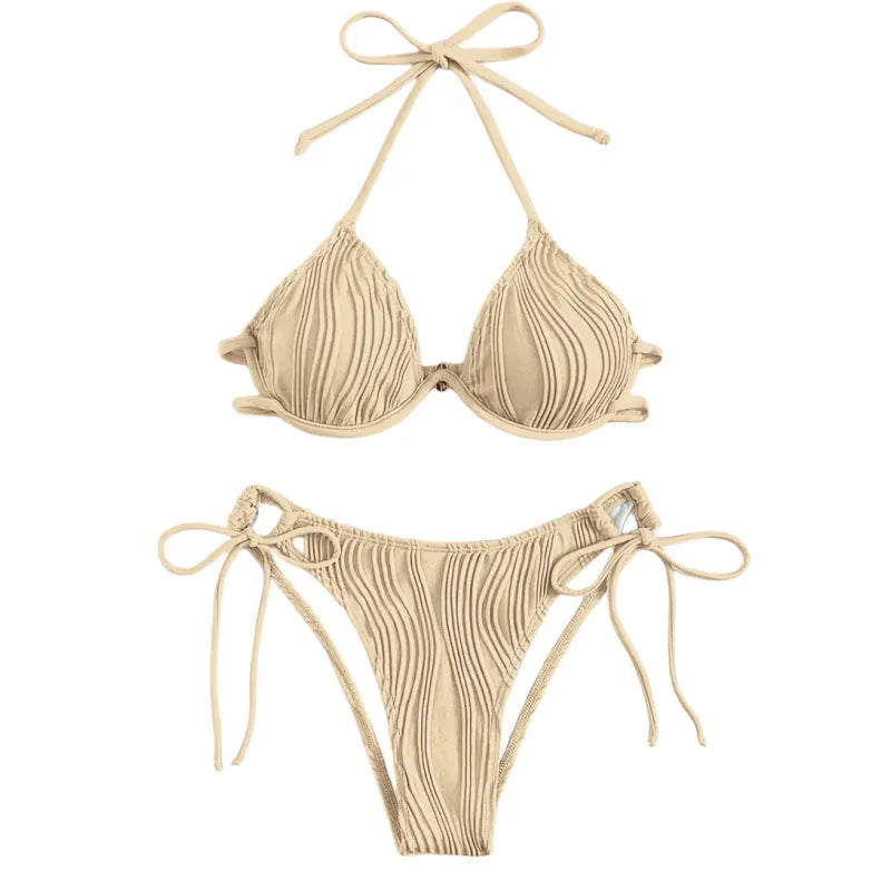 Women's apricot coloured underwire bikini top and bottom set for swimming.