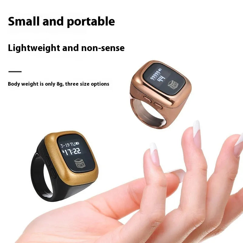 Al-Fatiha zikr counter electronic device with display screen on a black strap.
