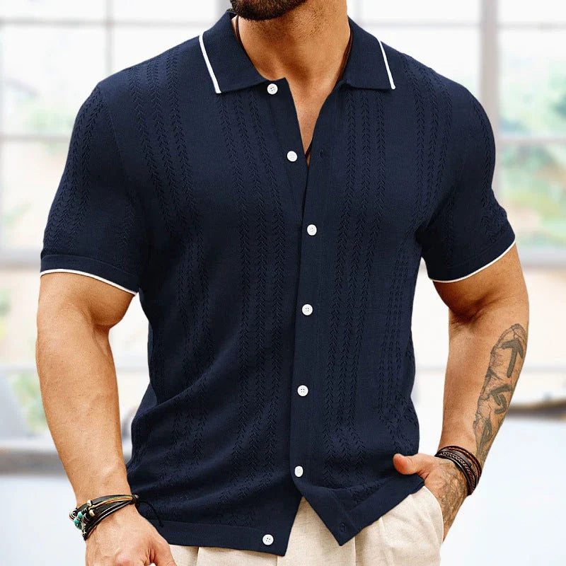 Short-sleeve polo shirt in brown, navy blue, and khaki colors with unique flocked design and regular fit