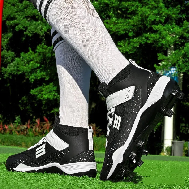 Black and white training sneakers with Velcro straps and rubber sole for sports.