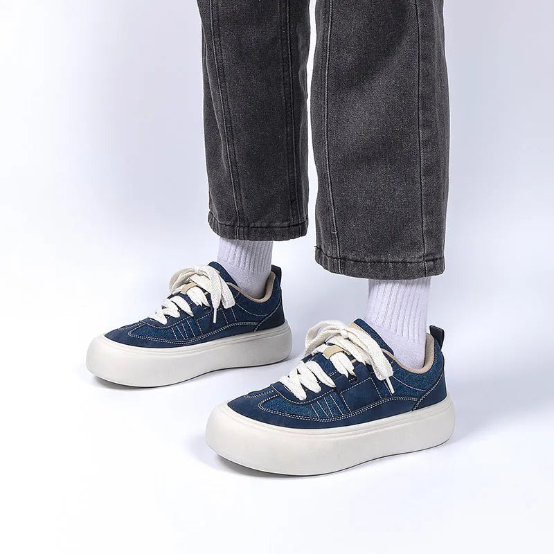 Men's black canvas platform lace-up shoes with a round toe and low-top design on a white background.