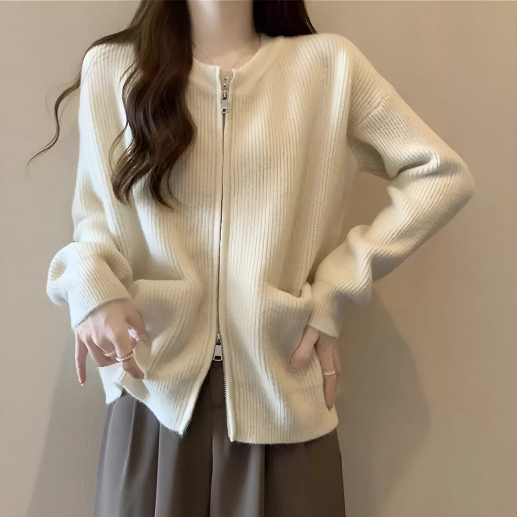 Beige long sleeve cardigan-style sweater coat made from soft viscose fibre fabric.