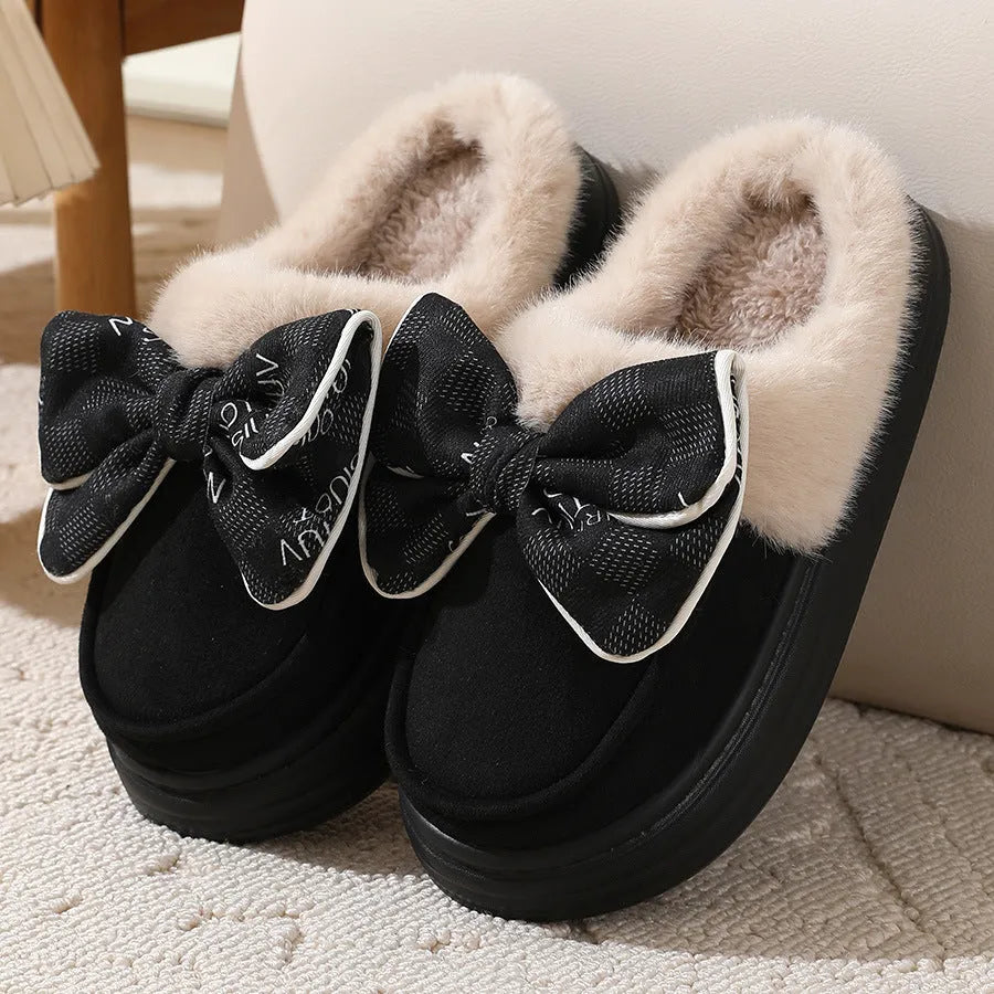 Bowknot plush slippers for women with suede upper, rubber sole, and short plush lining in bow brown, black, or khaki.