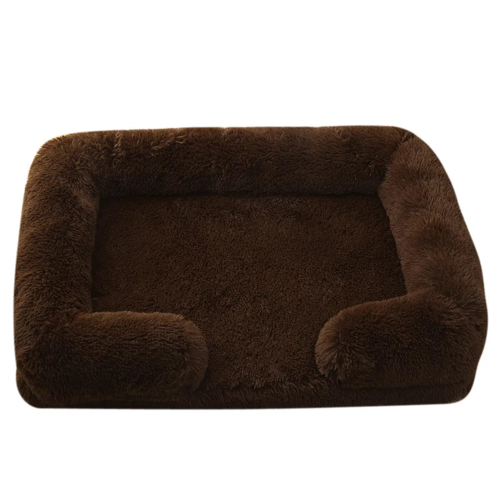 Plush round dog bed in beige brown with raised edges and a removable inner sleeve.