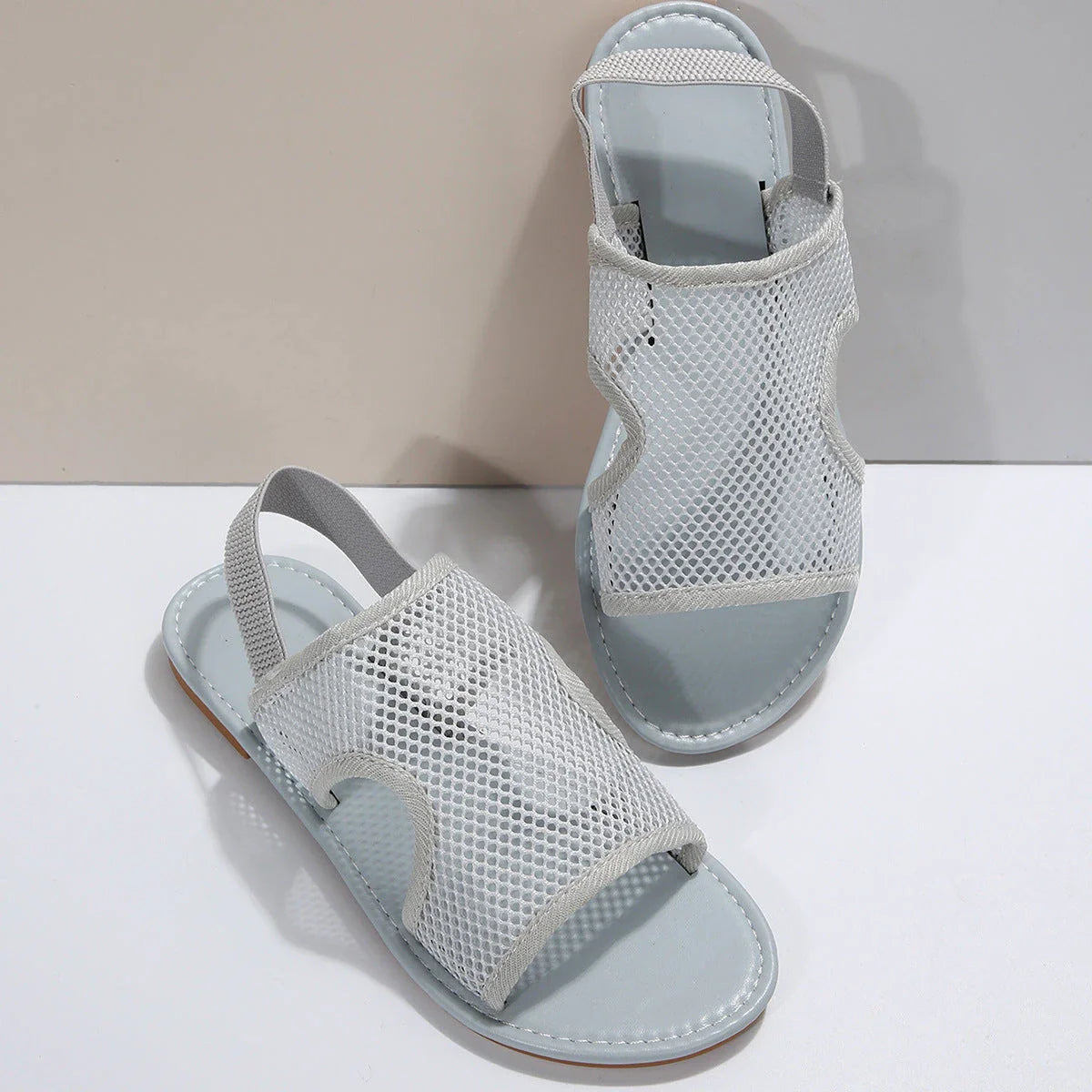 Stylish and breathable mesh sandals in various vibrant colors for men and women