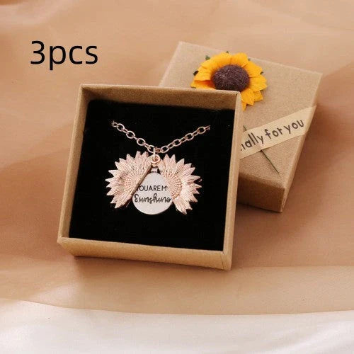 A stunning sunflower pendant necklace with an adjustable chain in various fashionable colors