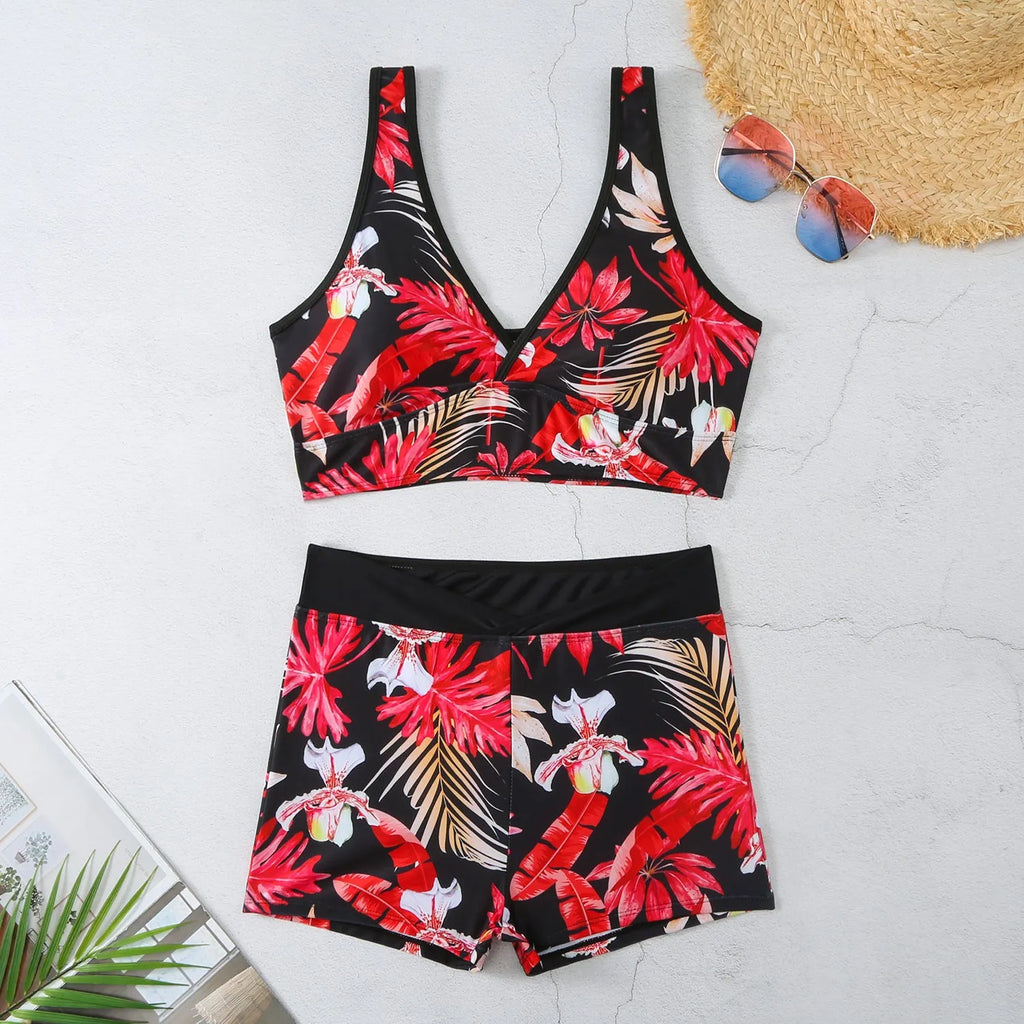 Women's two-piece swimsuit set with printed boxer-style briefs and sleeveless top in a multi-colour design.