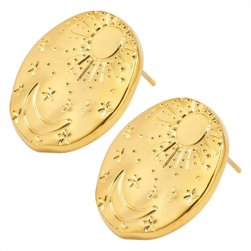 A pair of geometric shell design stud earrings for body piercing, made from 304 stainless steel in a gold or silver colour.