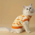 Orange cat sweater for autumn and winter wear, shown on a cat, with sizing options from S to XL.