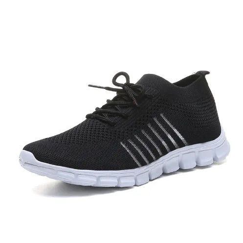 Women's high-cut lace-up platform sneakers in multiple colours on a rubber sole.