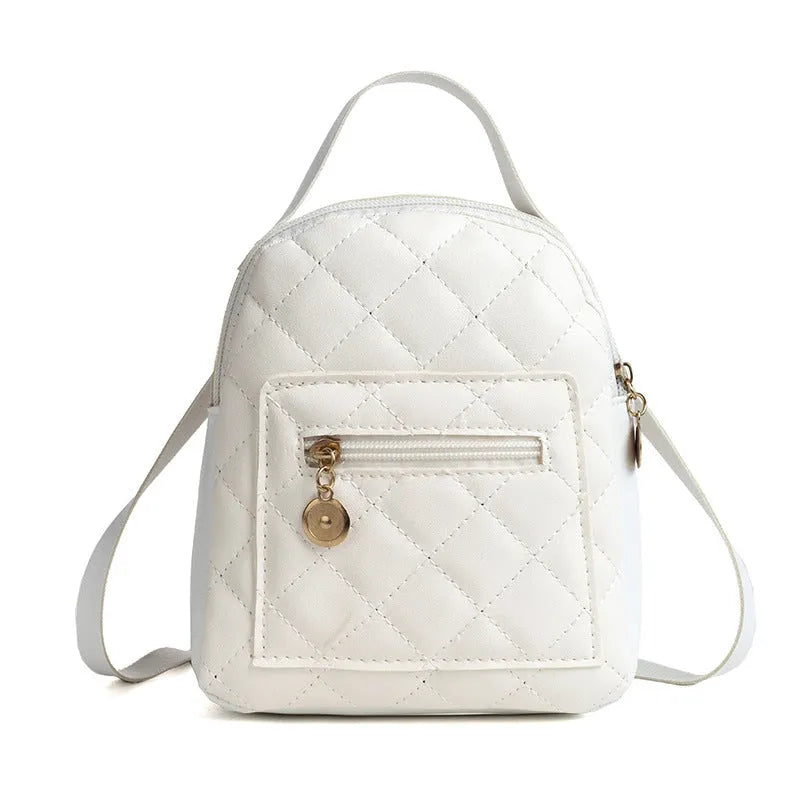 Hard Korean-style backpack with embroidery detail measuring 16x7x19cm in pink colour