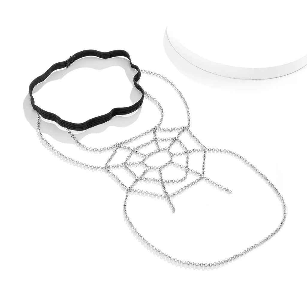 Women's geometric body chain in silver, made from alloy with electroplated finish, shown as an anklet