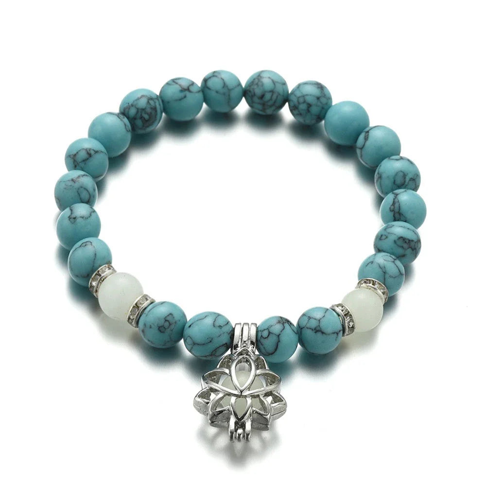 Luminous lotus charm bracelet with mesmerizing glow-in-the-dark beads, made of premium alloy and turquoise fluorescent stone