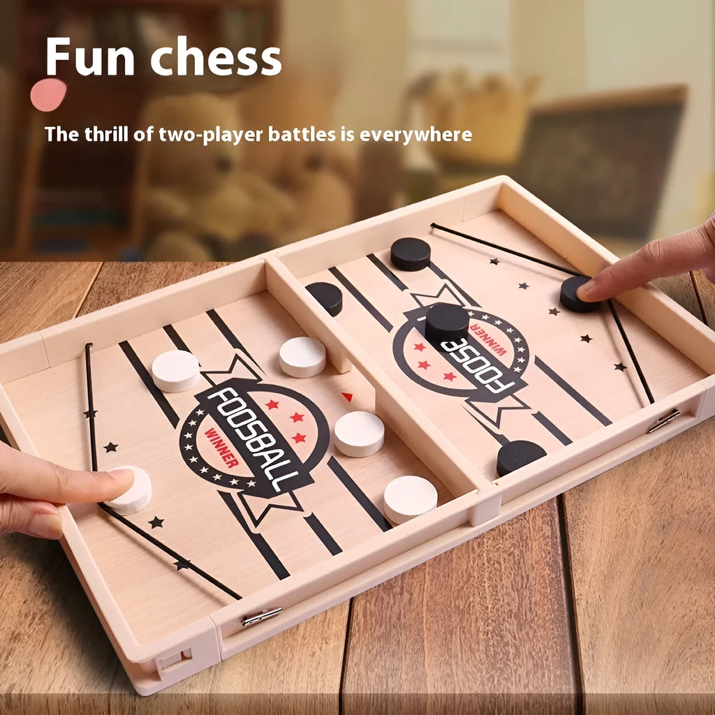 Wooden double battle catapult desktop board game with two-player pieces, shown as a tabletop parent-child puzzle toy.