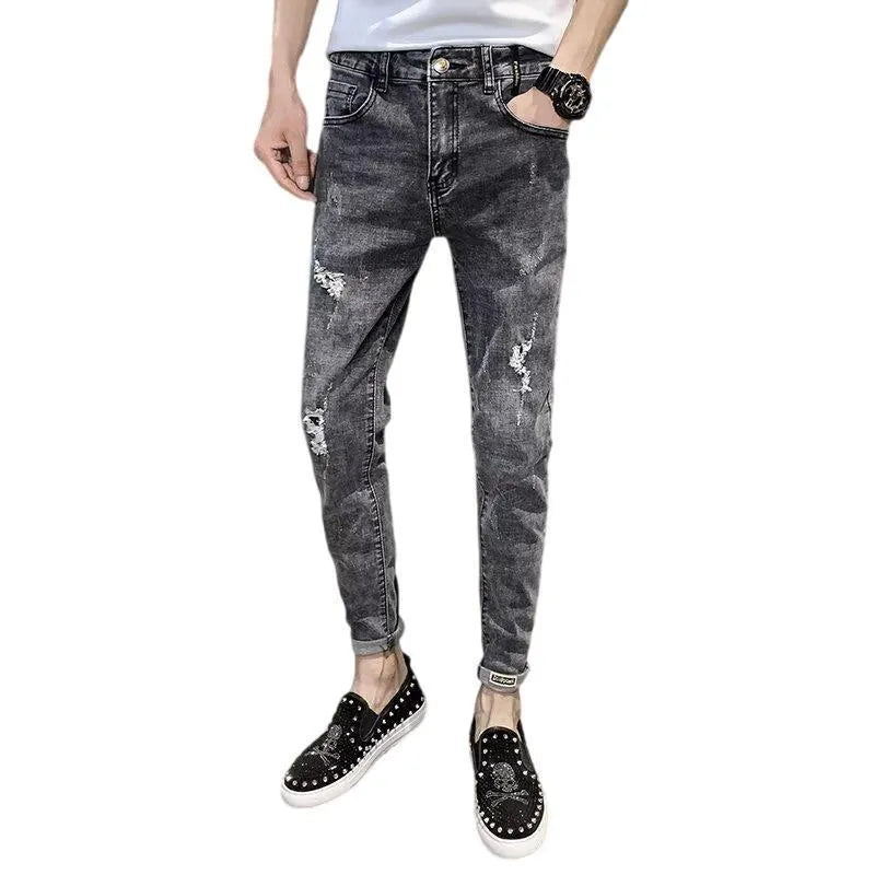 Men's high waist blue jeans with a five-pocket design and button fly on a mannequin.