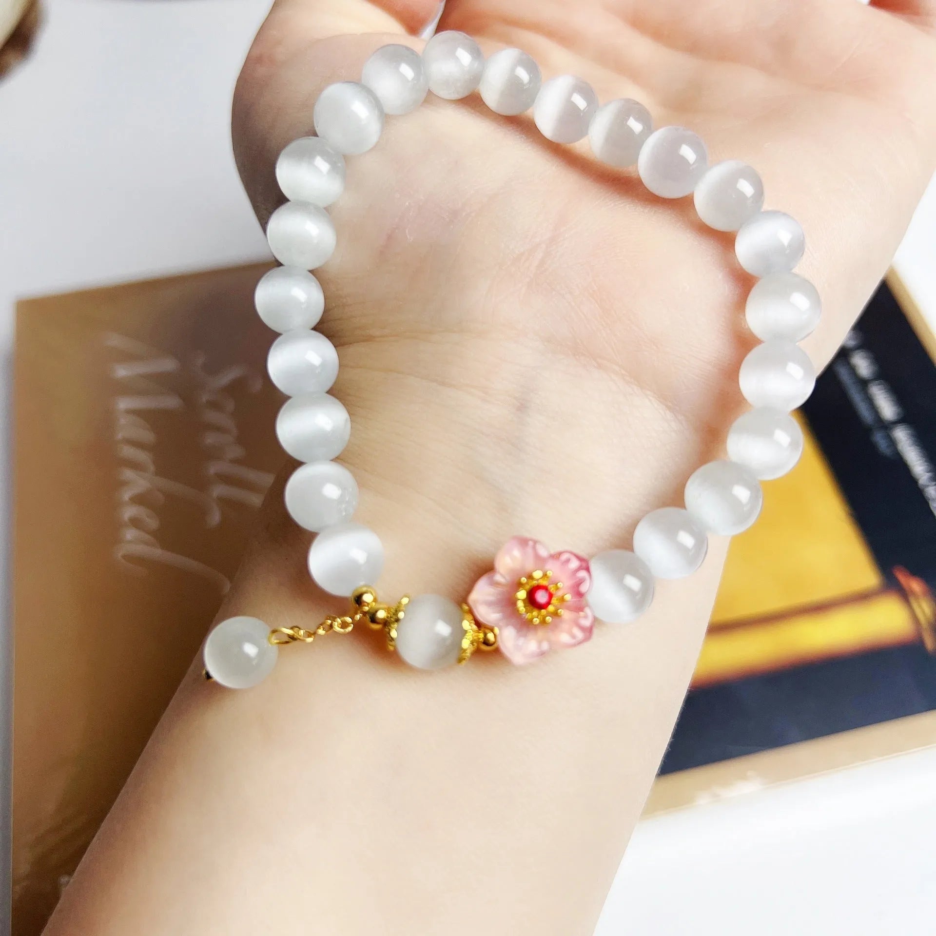 White opal flower beaded bracelet with Chinese style design using glass and coloured glaze materials