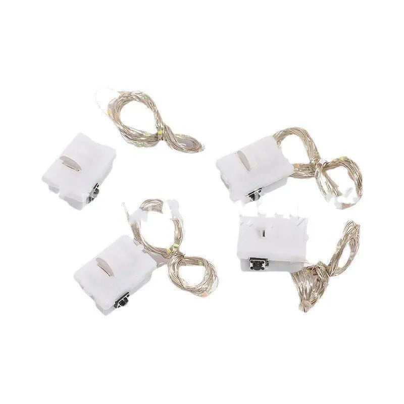 LED copper wire light in small white box with three-gear adjustment and 0.2m chain of four warm white LEDs
