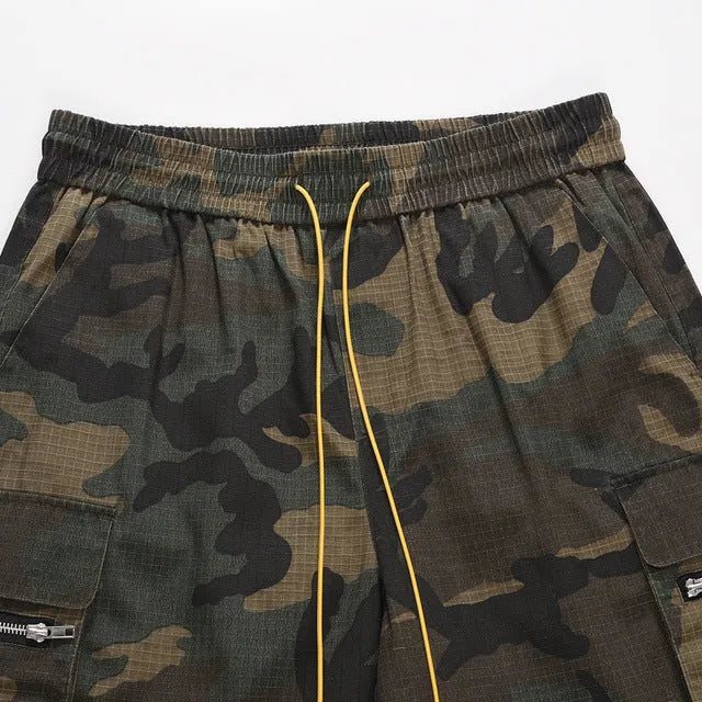 Green H215 washed camouflage cotton work shorts with multiple pockets on a mid-waist loose fit.