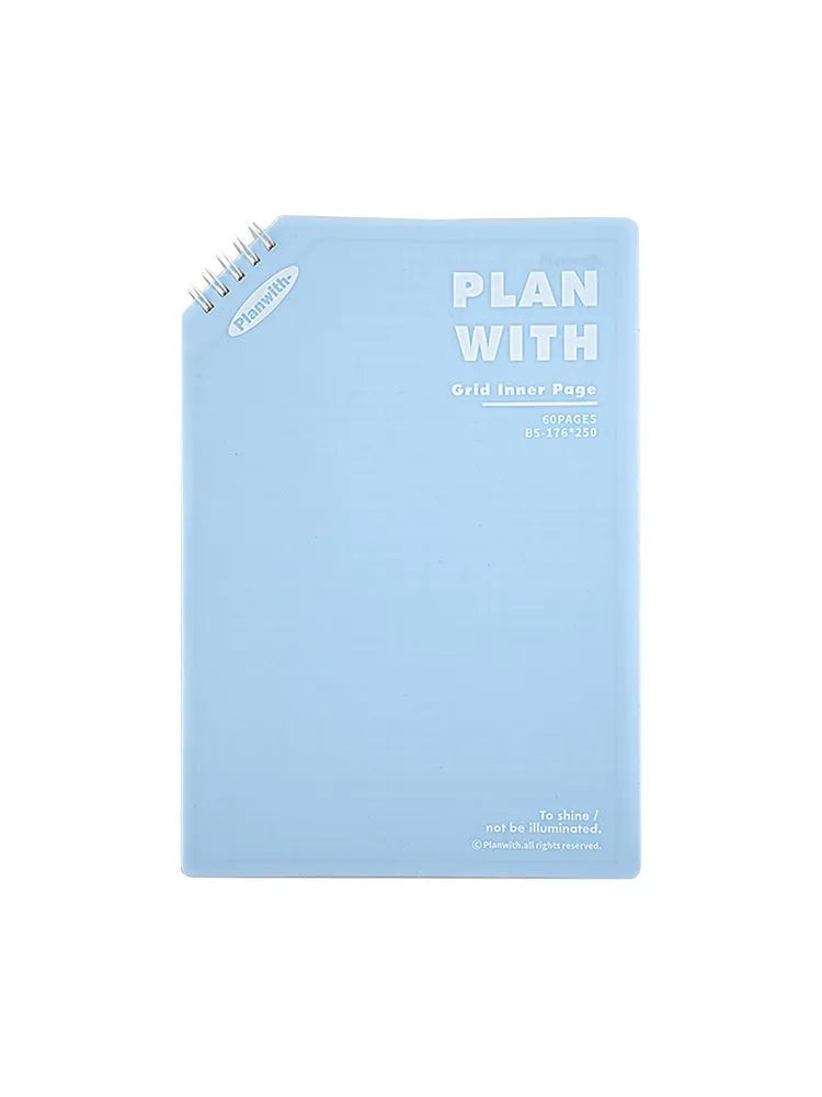 A5 and B5 draft notebooks with white, plaid, and blue covers for student art projects.
