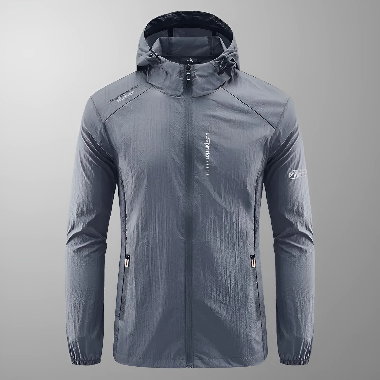 Man wearing a lightweight grey hooded nylon jacket suitable for summer outdoor activities.