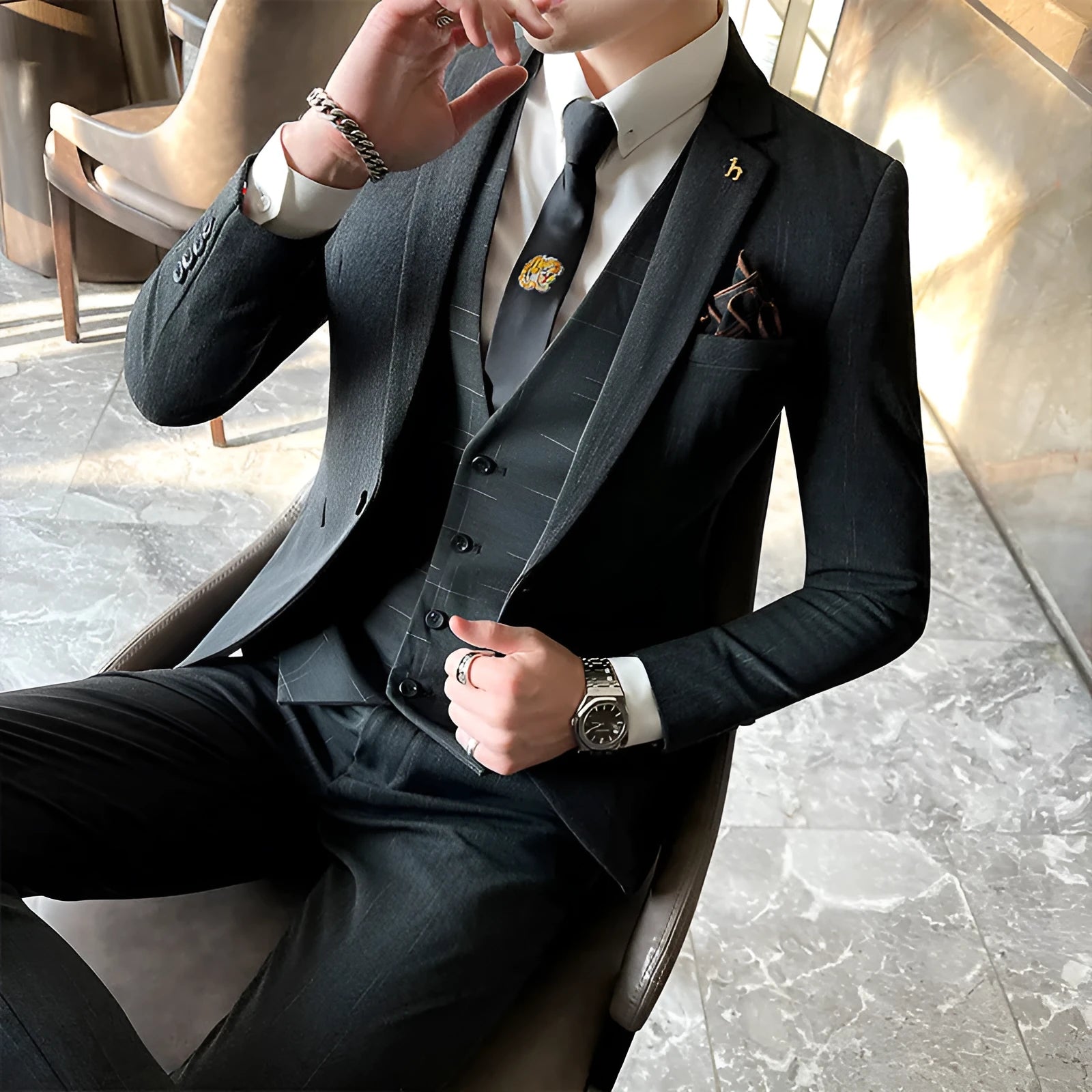 Slim fit men's business suit in black or dark grey with cotton blend fabric construction