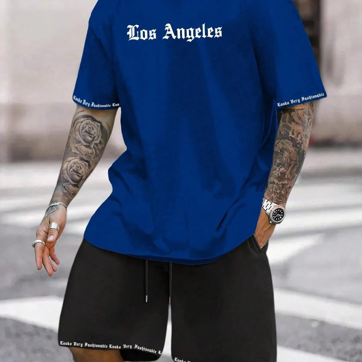 Men's blue printed short-sleeved top and matching shorts, a sports style co-ord set in quick-dry fabric.