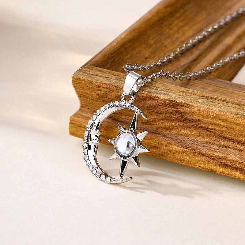 Stunning moon and star zircon pendant necklace in stainless steel with captivating celestial-inspired design