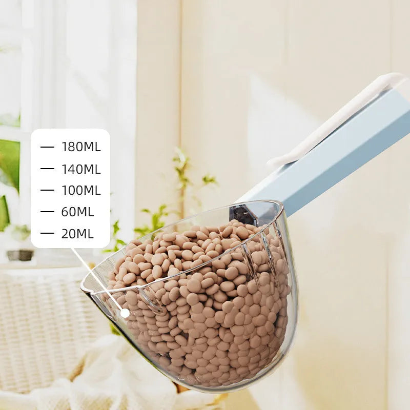 Pet food spoon with clip attachment in various colours for dog and cat feeding
