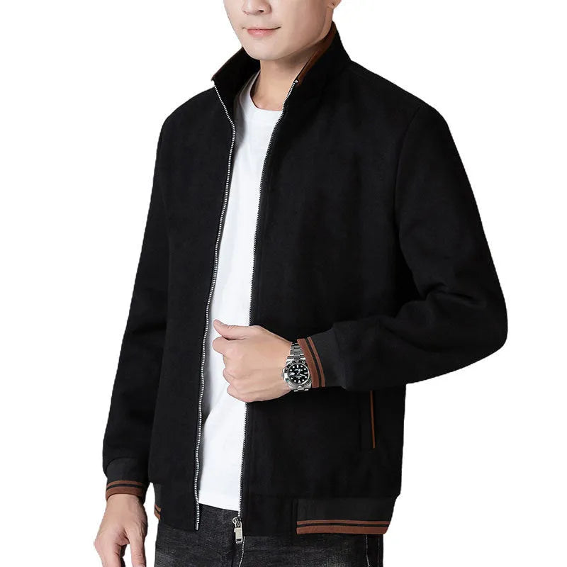 Men's grey polyester fleece jacket with zip front, long sleeves, and a chest pocket, shown on a hanger.