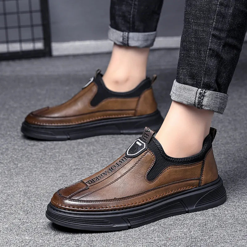 Men's solid colour casual leather shoes in black and brown with round toe design