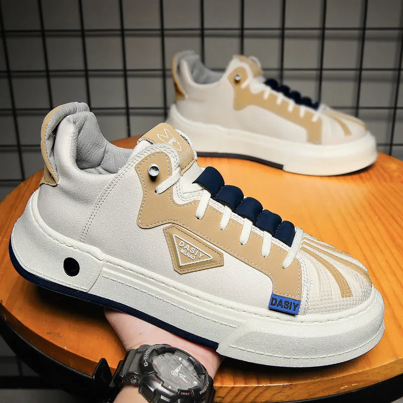 Men's beige low-top sneakers with elastic band closure and leather stitching detail on microfiber upper