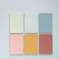 Large 12cm by 8cm colourful Post-it notes showing six different colours in a self-adhesive sticky note pack