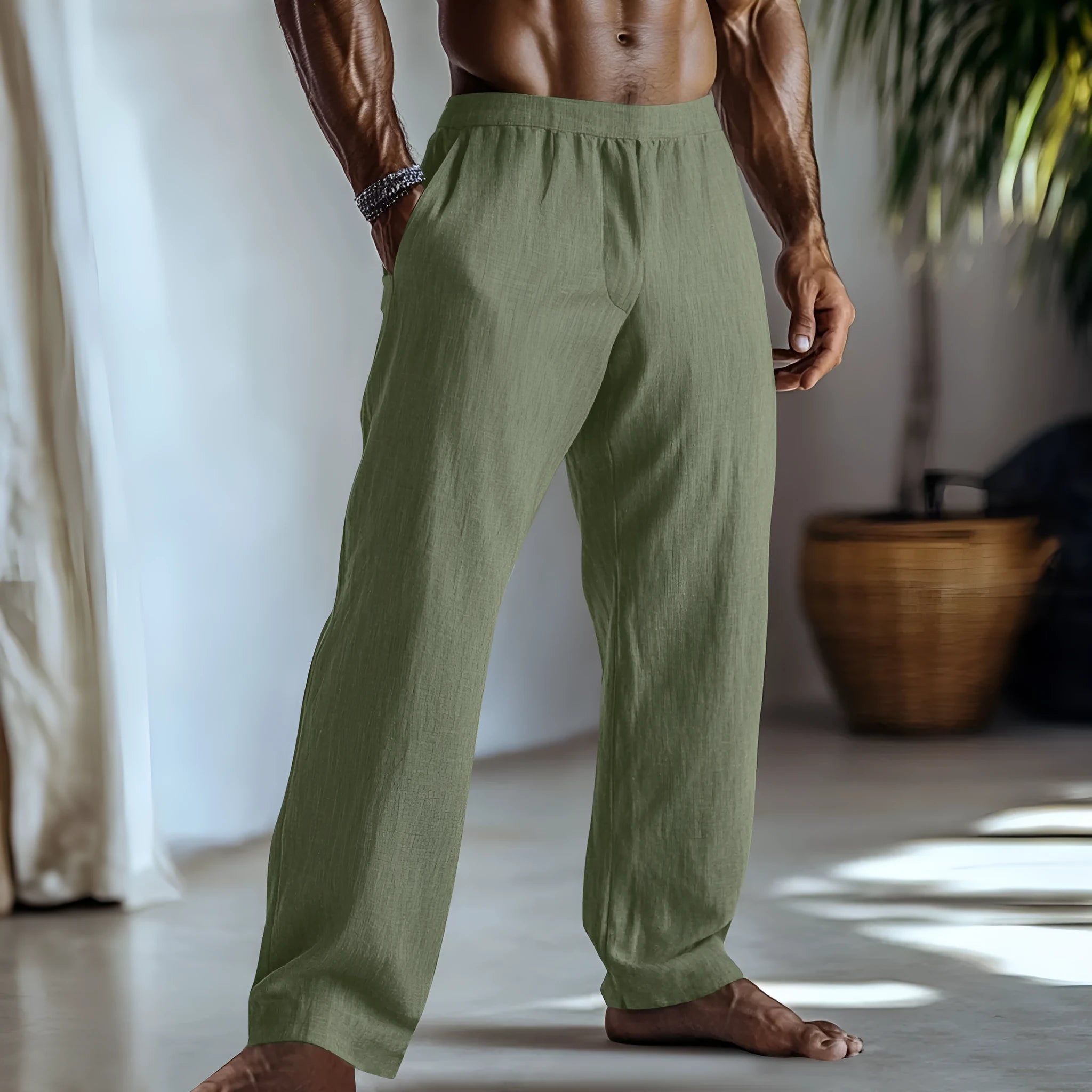 Straight-leg casual trousers in cotton and linen fabric on a hanger.
