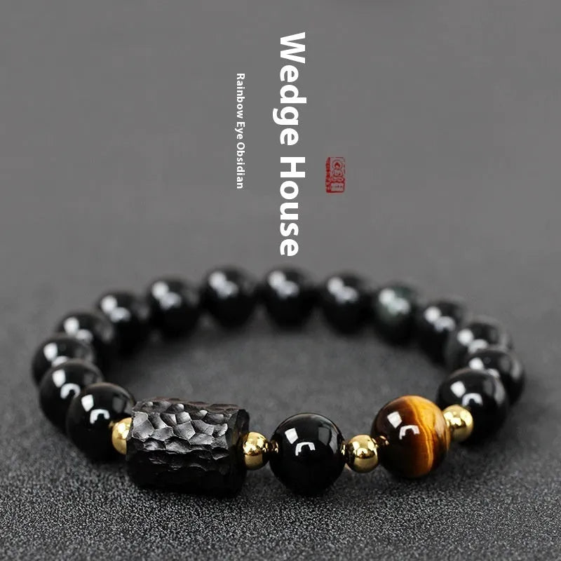 Obsidian bracelet with tiger eye beads in 10mm size showing manual craftsmanship and unisex design