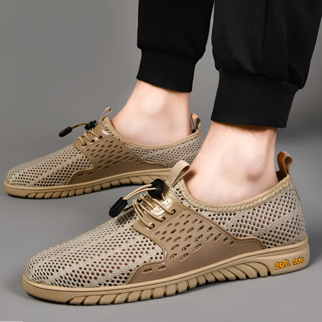 Men's black mesh casual shoes with elastic band fastening and rubber sole