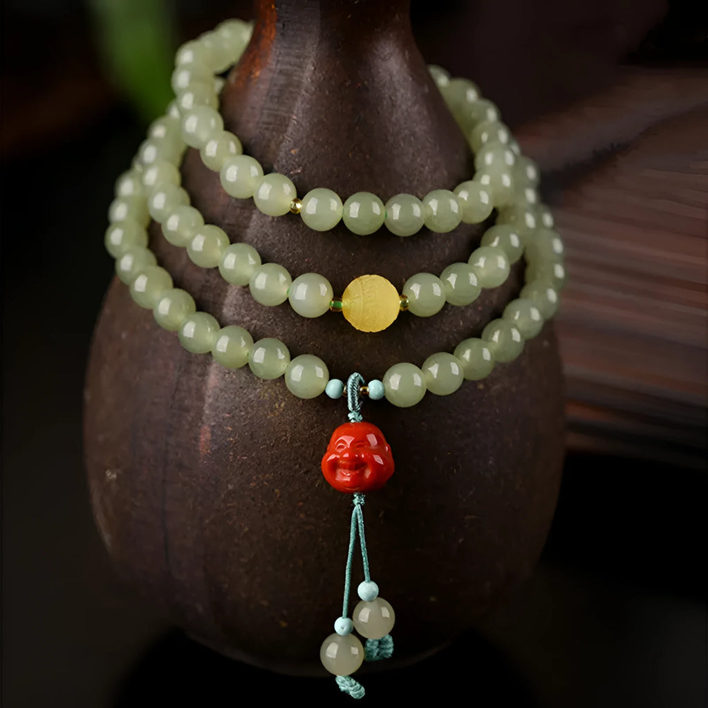 Pale blue Hetian Jade bracelet with 6mm beads arranged in three-circle pattern on elastic string