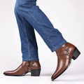 Black wild style unisex chain boots with side zipper and chunky horseshoe heel.