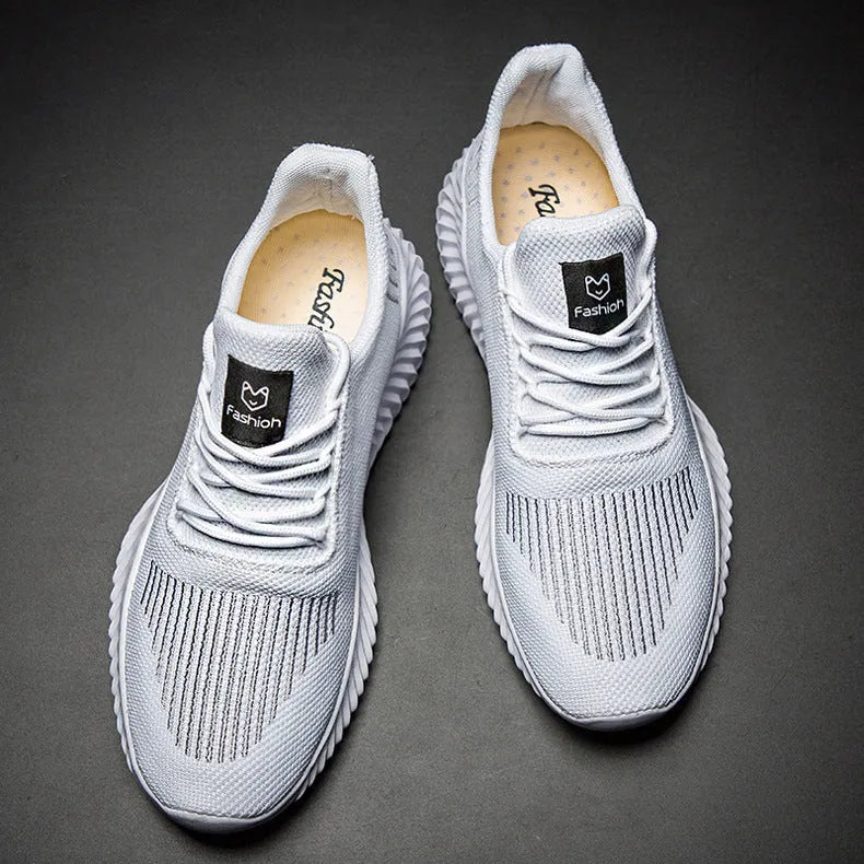 Men's breathable ultra-light running shoes with white upper and grey sole, side view