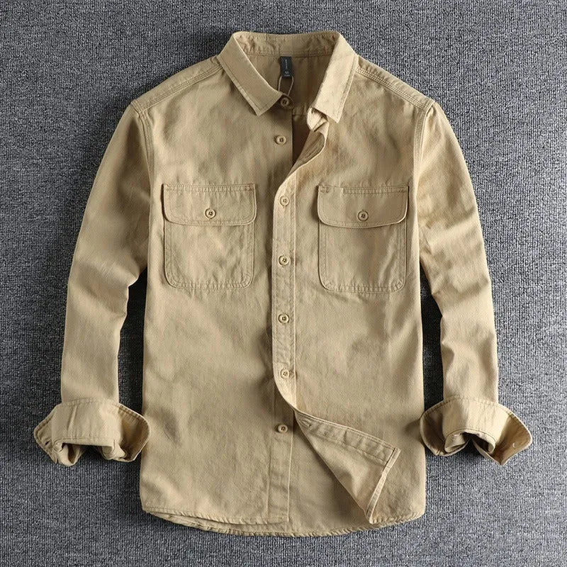 Men's loose fit long sleeve polyester overall shirt in light grey.