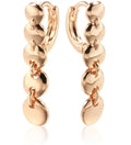 Gold-coloured retro circle earrings with woven copper construction and geometric design