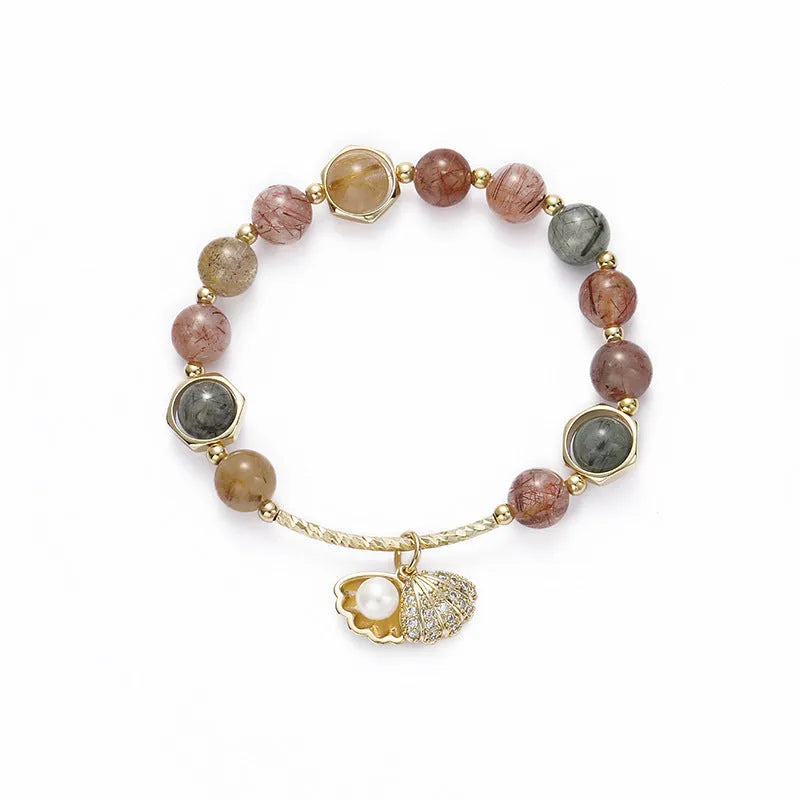 Colourful crystal shell bracelet with red sealant flower designs and animal zodiac motifs