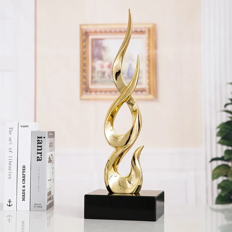 Resin festival high-rise decoration craft in bright gold colour with modern simple design
