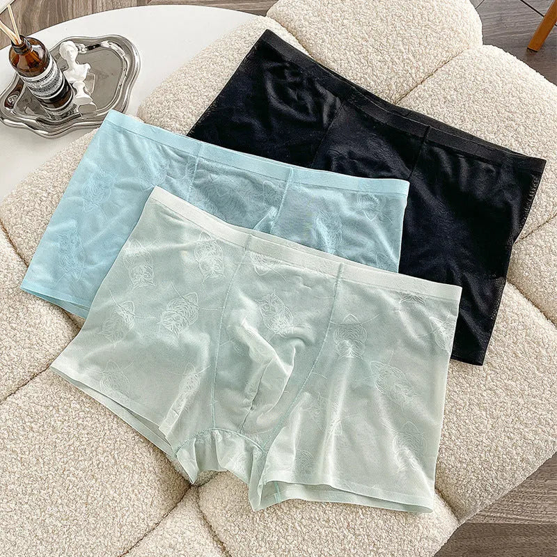 Men's ice silk seamless boxer briefs in mint green, black, light pink, light coffee, cyan, and sky blue