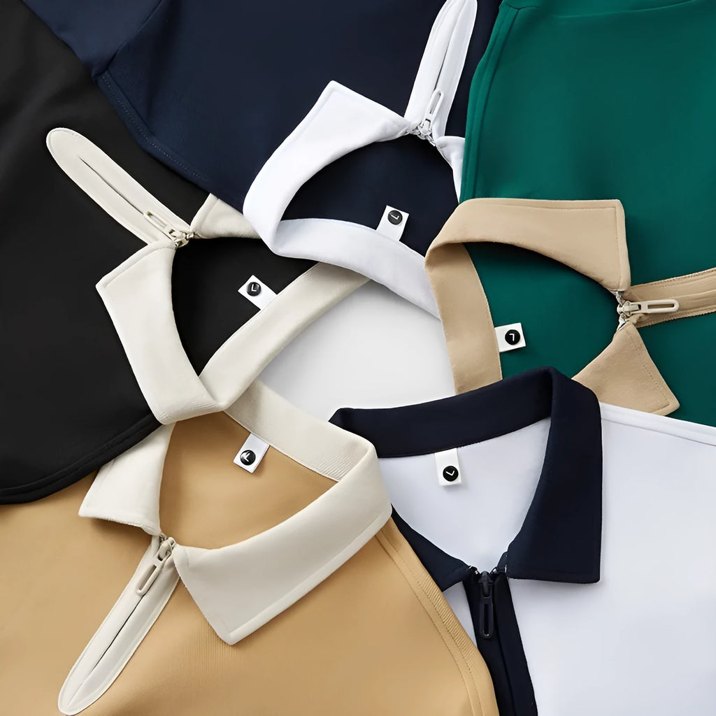 Man wearing a solid colour zipper and lapel polo shirt with short sleeves in a loose fit.