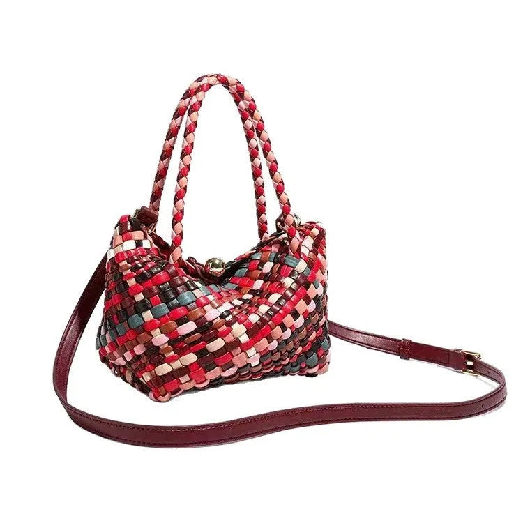 Women's colourful woven PU leather shoulder bag showing handmade texture