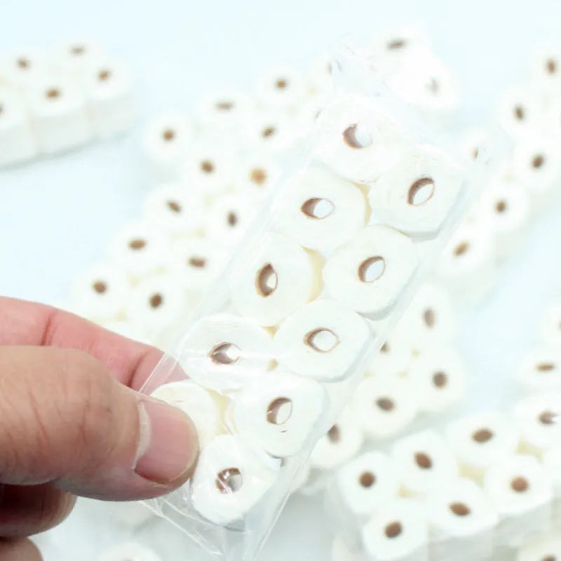 Miniature paper simulated toilet paper roll model with cardboard tube for children.