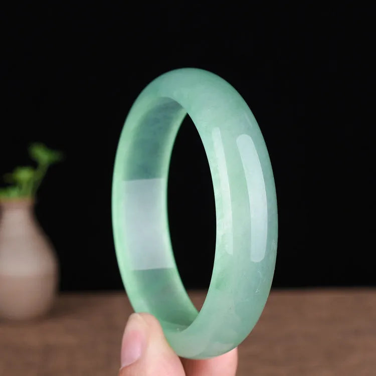 Women's oil cyan light green quartz jade bracelet showing modern simplicity design