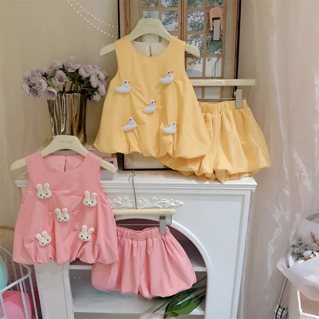 Cotton two-piece suit with long-sleeve shirt and pants, bud-shaped doll detail, pink or yellow, sizes 80-130 yards.