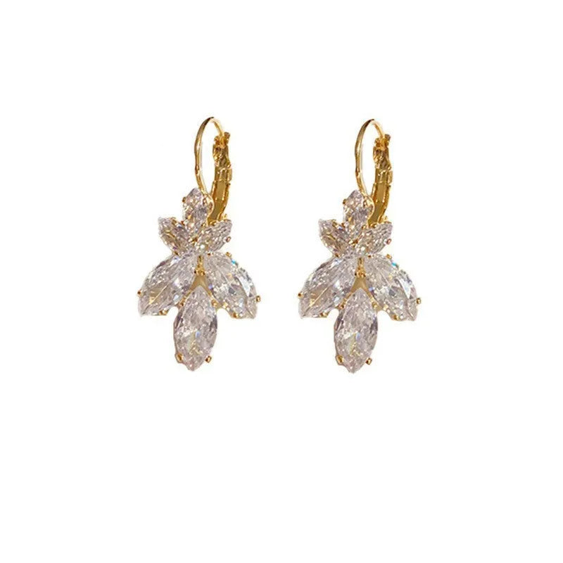 Women's delicate leaf earrings with inlaid zircon stones in platinum colour