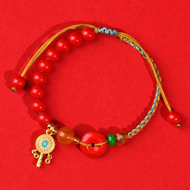 Hand-woven cinnabar peace blessing bracelet in emperor red sand colour with geometric national style design